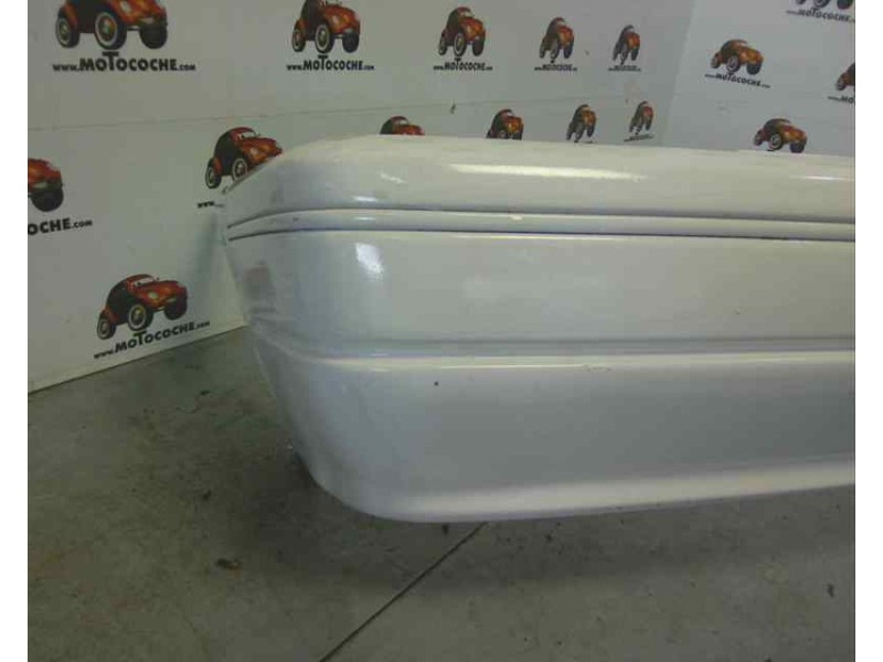 Recambio de paragolpes trasero para ford escort cabrio highlight referencia OEM IAM 6184980  7289