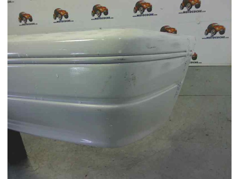 Recambio de paragolpes trasero para ford escort cabrio highlight referencia OEM IAM 6184980  7289