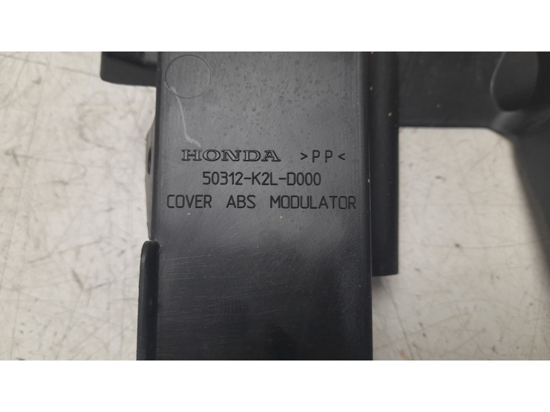 Recambio de moldura para honda adv 350 referencia OEM IAM 50312K2LD00  