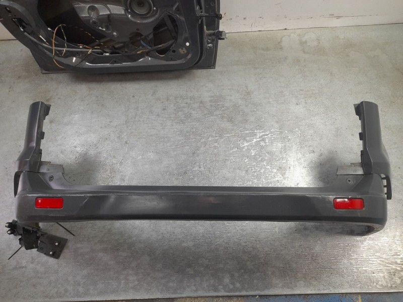 Recambio de paragolpes trasero para ford transit courier b460 furgoneta/monovolumen 1.5 tdci referencia OEM IAM 2465725  
