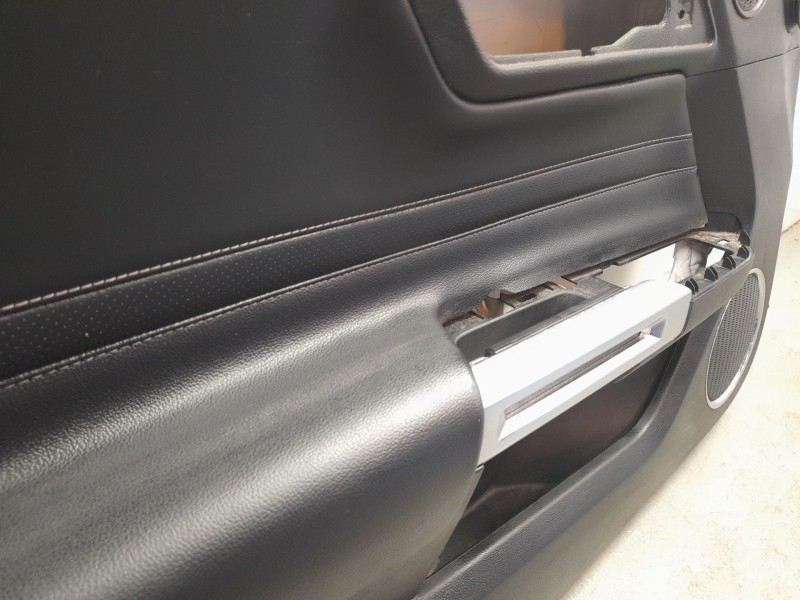 Recambio de guarnecido puerta delantera izquierda para ford mustang convertible gt referencia OEM IAM JR3B6323943  